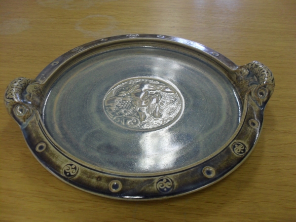 <span class="semi"><a href="/artwork/view/63">Yellow Platter ( Clay )</a></span>